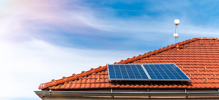 solar panels on the roof of a family house.